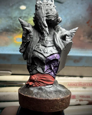 The same spooky lady, now with a spooky red sash.