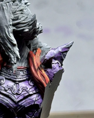 A pointy bit of the Spooky Lady may be casting a small pointy shadow, or her spooky cape may just need a wash.