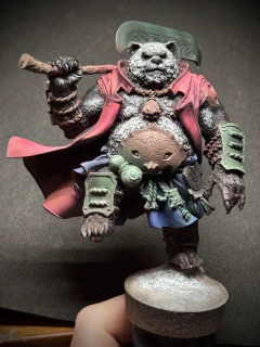 A big old floof, now with the beginnings of a reddish cloak and blueish skirt. Too big? Almost certainly. But _never_ too floof.
