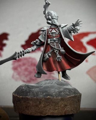 The tabard… smock?… of the tiny man has a variety of Reds applied, in a manner that suggests that many, many hours of blending lie ahead, all for an area approximately the size of one (1) human thumbnail.