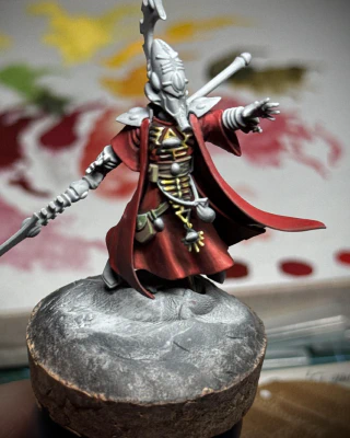 Front view of the lil guy with the remaining fabric elements now red instead of primer white.