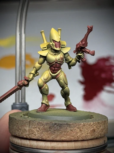 A very similar mini to the last, this time with Averland Sunset (Citadel) as the primary colour and Berserker Red (Two Thin Coats) as the accent. No details are specifically picked out, just letting the sculpt be the sculpt. Craven Yellow (TTC) used very sparingly as an extreme highlight.