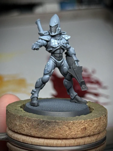 An infinity rune has been painted onto the upper thigh of the right leg and the diamond pattern from the chest continued onto the left pauldron. It’s ‘more’, but I think it may lead to a lesser overall effect?