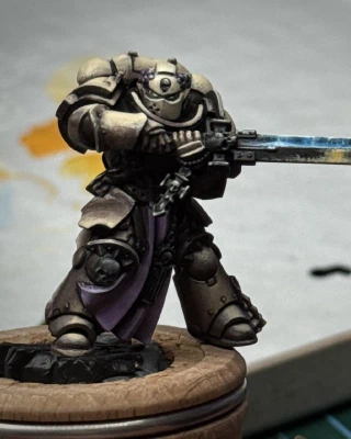Some careful poking and sweaty blending and finally the mini is now almost indistinguishable from the previous shot. Except that he seems to have something in his right eye? He’s not crying, _you’re_ crying.