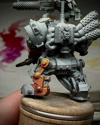 The rear of the Ork boss is mostly still primer, but an attempt is being made to remember yellow on his leg. The majority of this mini will be trying to remember yellow on things.