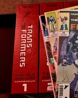 Four absurdly massive hardback compendium volumes of the eighties Transformer comic run, across Marvel US and Marvel UK, with three Kickstarter-exclusive individual comic reprints (sleeved).