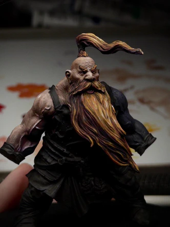 One (absurdly muscular) arm of the mini now has a range of tones from purple in deepest shadow through reddish browns to a small specular highlight of pure ivory on the side delt. Veins, as they say, are poppin’.