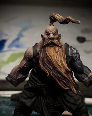 Tiny curly bits are being drawn around the central tattoo circle on the biggest left shoulder bump, white paint on dark blue. Approximately one one tenth of one percent compete. You can hear the tears falling gently, splish slash, just offscreen.