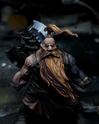 Look. We can all agree that the tattoo is a huge and life-altering mistake that I’ll be paying for forever. So why not compound it with a massive ‘steel’ axe that will take just as long?

In this shot the upper blade has been sketched in, it’s a bit too blue and not quite bright enough at the brightest point. It also definitely reads a bit ‘fantasy comic illustration’ rather than ‘real’. Which isn’t bad necessarily, but doesn’t quite fit the rest of the mini.