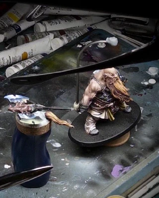 One painting handle for the dwarf, one for the axe and top-knot, that’s always been my motto. They said I was _mad_, but who’s laughing now?

The pile of background paints is accreting, fast becoming an entity with its opinions on the matter.