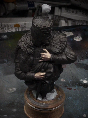 Wrinkles and veins and dark shadows sketched out on the hands, hopefully as though fairly starkly-lit from above, stage-right. I think this guy may be up to no good.
