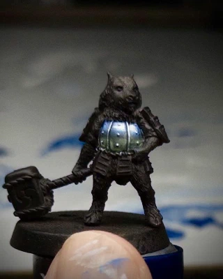 The tiny pupper’s breastplate now has a mix of blues and greens blobbed together in something that might, if you squint, be taken for a reflection of unseen surrounding nature. Heavy white has been applied on the uppermost curvy bits in a lie (blatant! unrepentant!) to imply bright directional light.